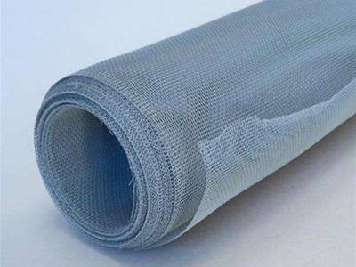 A roll of aluminum alloy mosquito netting on the white background.