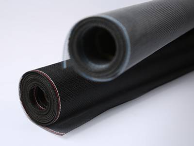 A roll gray and a roll of black fiberglass mosquito netting on the white background.