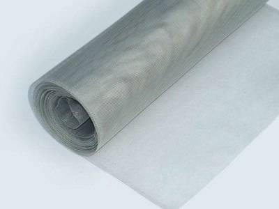 A roll of stainless steel mosquito netting on the white background.