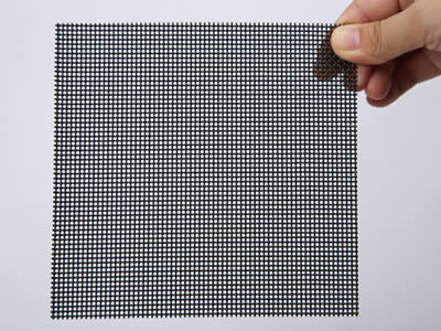 A whole piece of black aluminum alloy wire security screen on the white background.