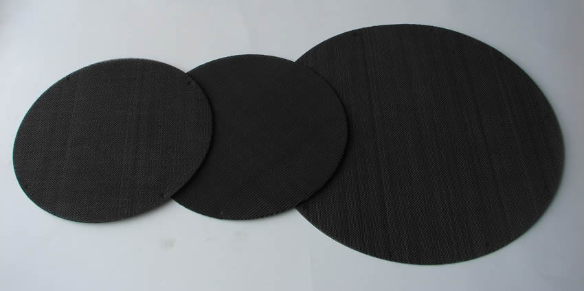There are three black wire cloth filter discs with different sizes.
