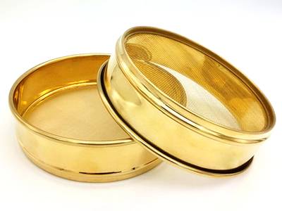 Two test sieves are made of woven brass wire meshes with brass frames.
