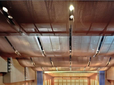 Copper wire screen decorates the concert hall ceiling.