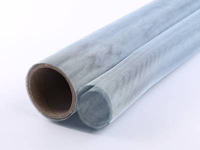 A roll of bluish galvanized window screen on the white background.