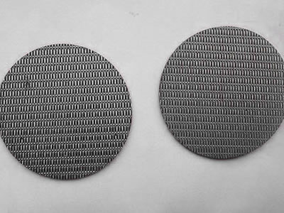 There are two stainless steel reverse dutch wire mesh filter discs.
