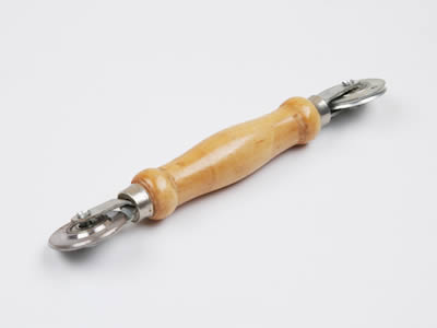 One stainless steel spline roller consists of one metal concave wheel and one metal convex wheel at two ends and a wooden handle on the white background.