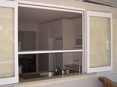 The kitchen window is installed with roller insect screen.